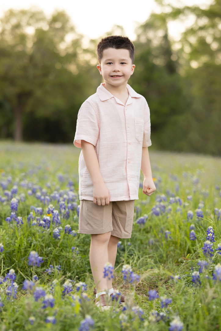 Cy portrait in bluebonnets